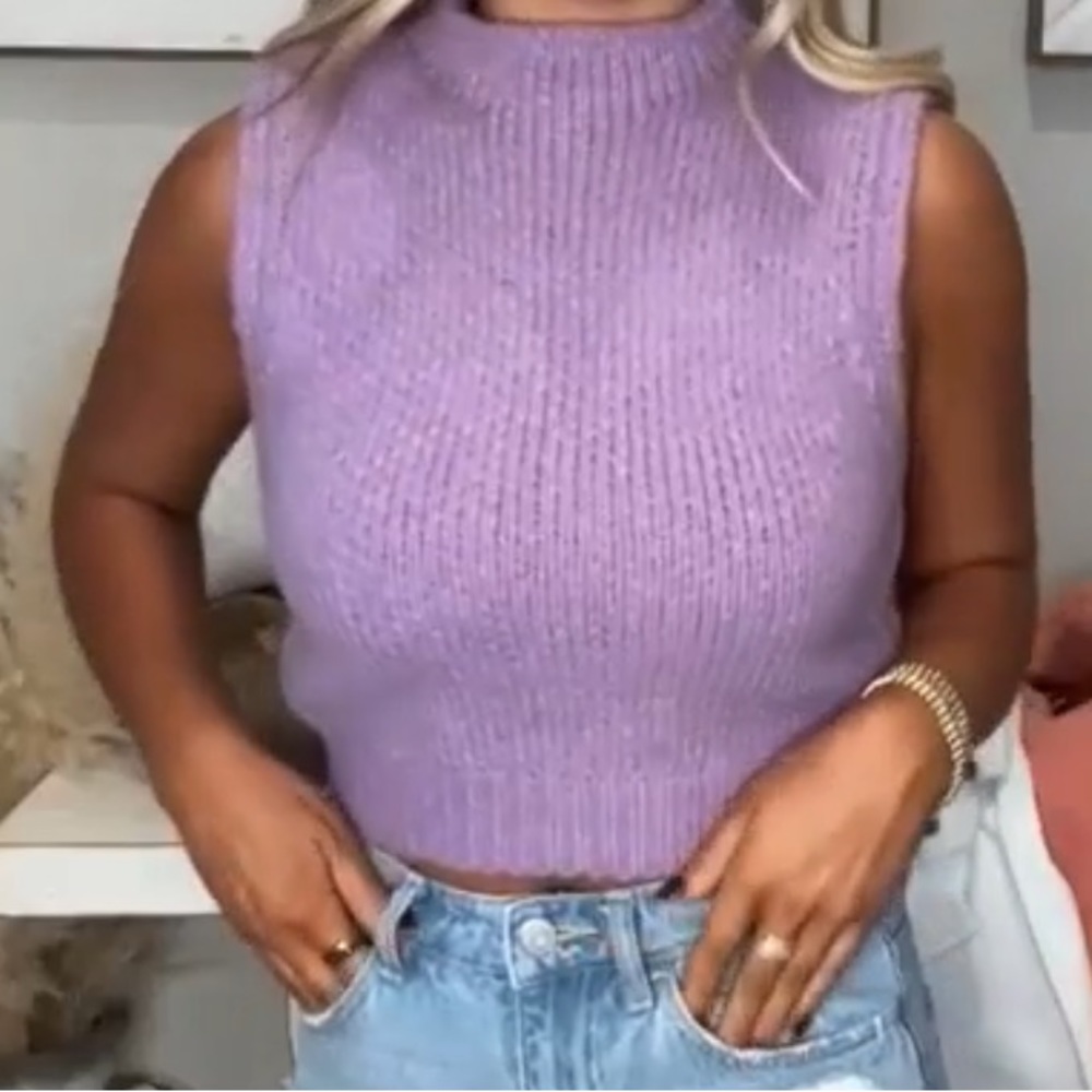 Never worn- mock neck sleeveless sweater